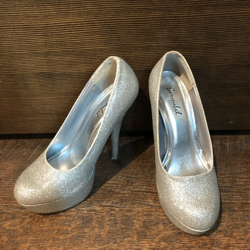 Silver high heeled pumps
